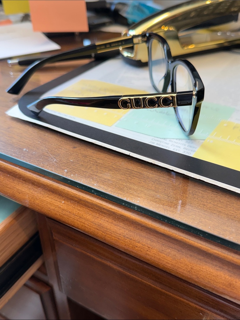 Gucci Black Frames with Gold Logo Accent